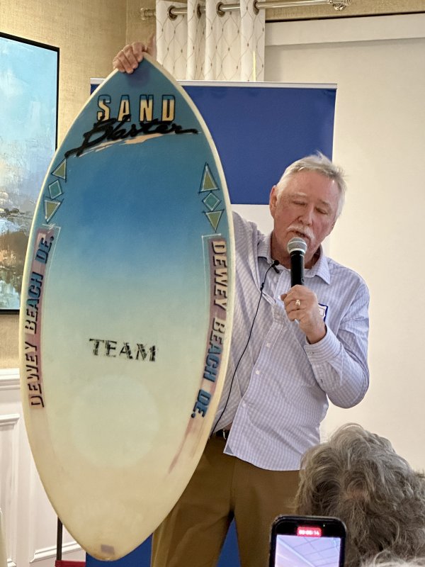 Harry Wilson demonstrates how skimboard construction has changed over the years.